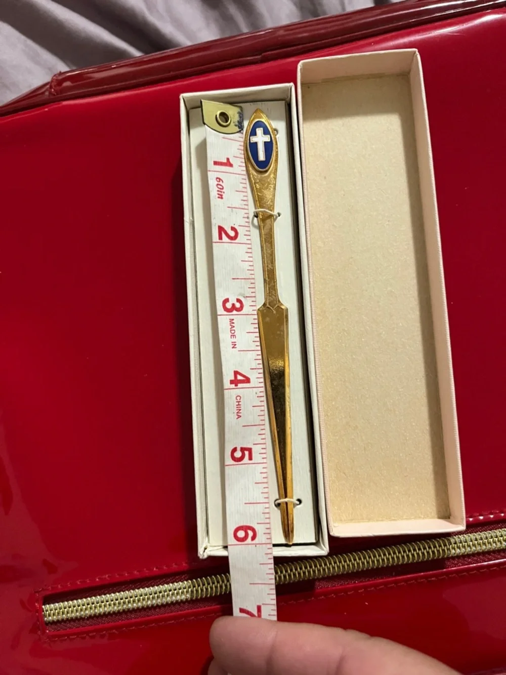 Vintage Gold Letter Opener with Blue and White Cross Emblem